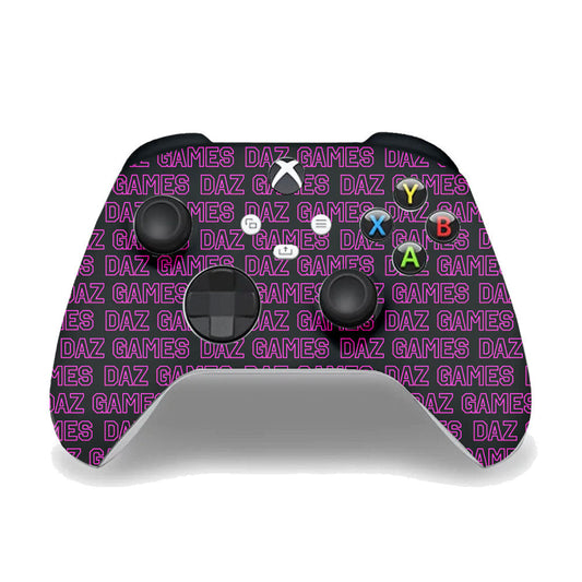 Xbox controller with a custom purple and pink ’Daz Games’ patterned skin.